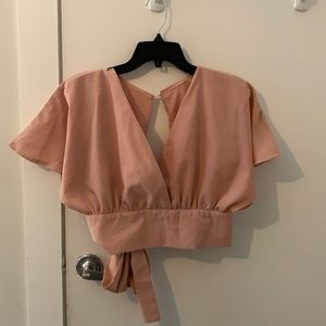 Short sleeve, open back crop top with tie in back